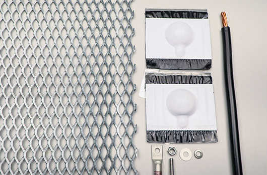 mesh patterned zinc sheet with parts for sensor on side