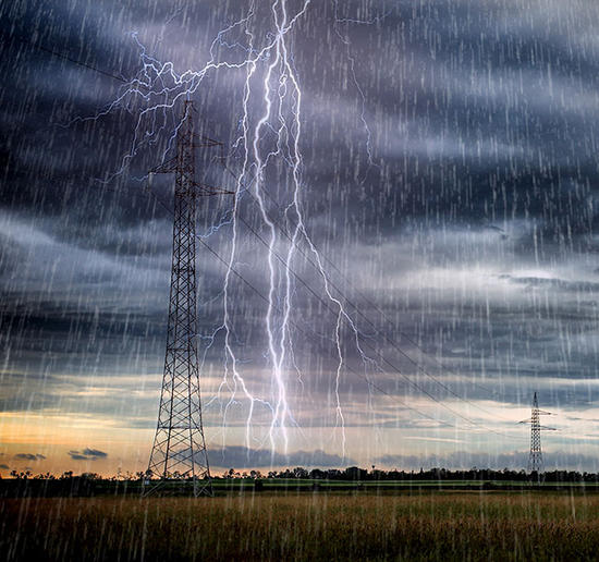 Lightning striking a high voltage tone in an open field